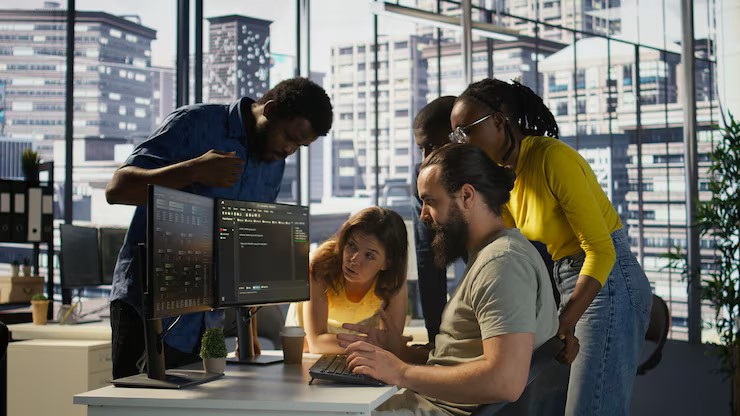 IT professionals collaborating on secure business technology solutions